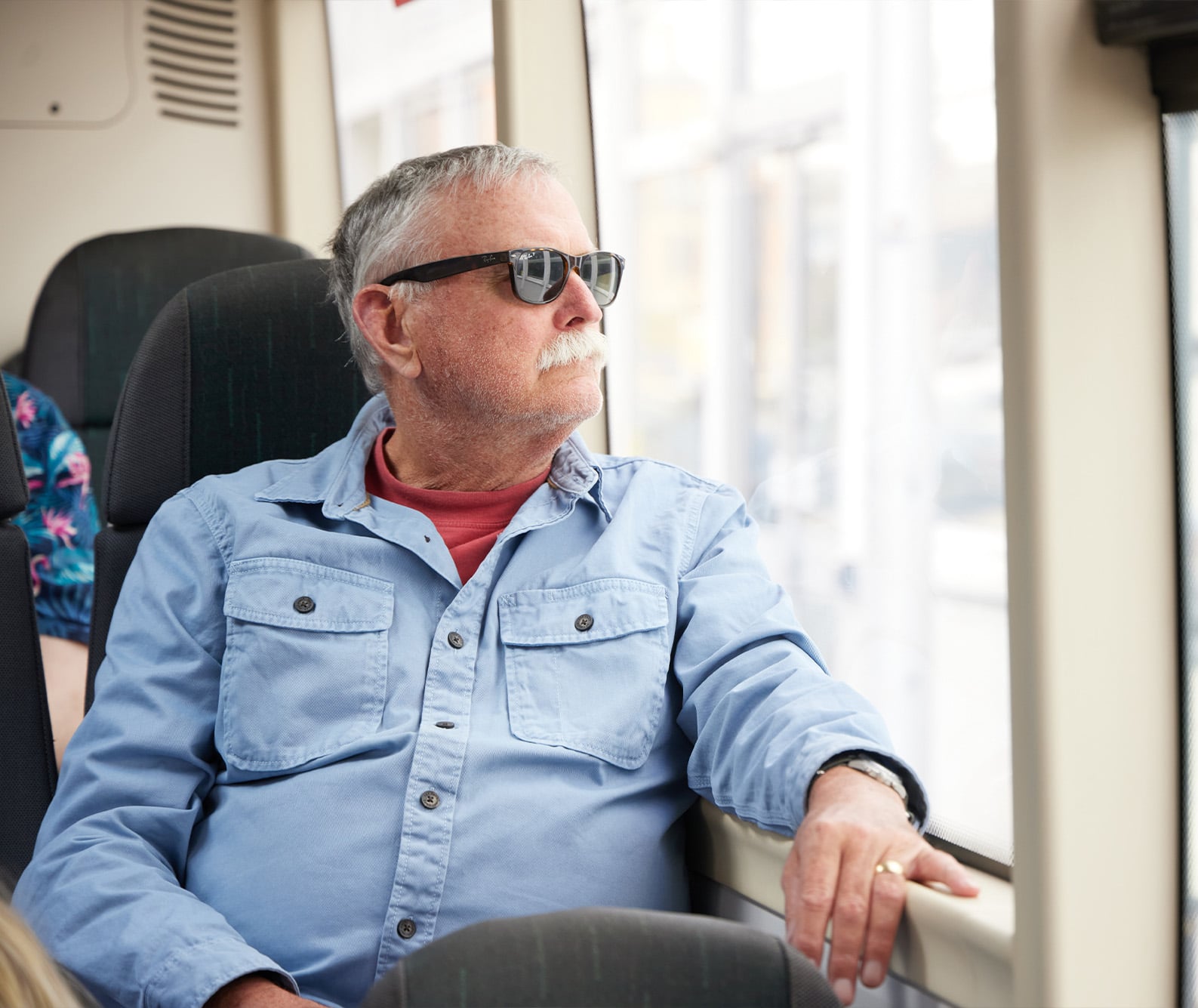 Warm weather bus passenger